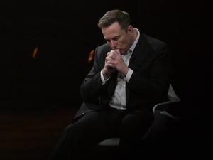 Elon Musk reacts as he visits the Vivatech technology startups and innovation fair at the Porte de Versailles exhibition center in Paris, on June 16, 2023. 